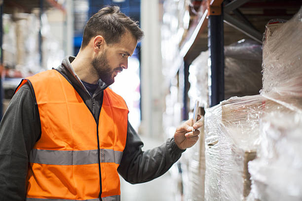 istock Working hard. Wearhouse workers. 639347286