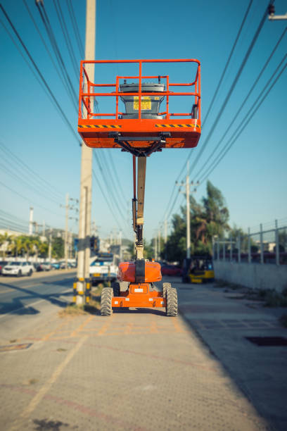 istock Lifting boom lift in construction site. 639347650