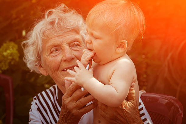 great grandmother with baby - great grandmother imagens e fotografias de stock