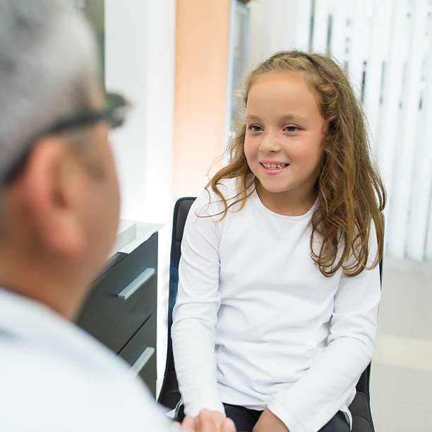 istock Doctor examining a child 639358358