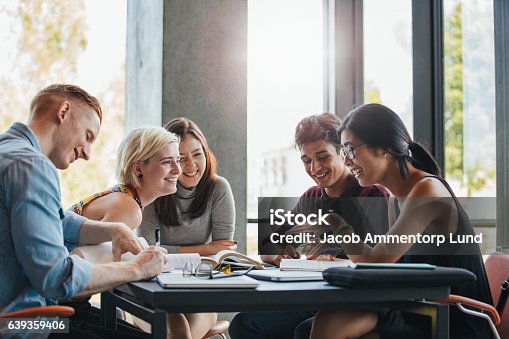 istock Students studying in college library 639359406