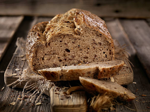 9 Grain Artisan Bread Loaf 9 Grain Artisan Bread Loaf - Photographed on a Hasselblad H3D11-39 megapixel Camera System bran stock pictures, royalty-free photos & images