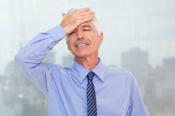 istock Forgetful senior businessman slapping forehead 639363922