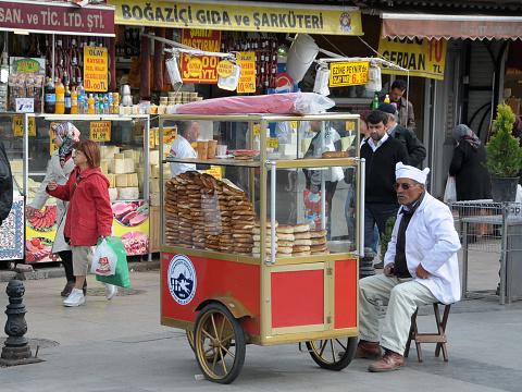 Istanbul, Turkey - may 05, 2009: Bread salesman with cart, in Eminonu Square, historic city center