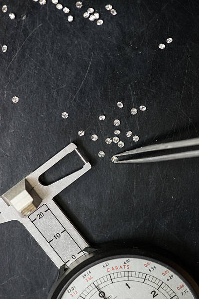 Professional gemstone settings jewellery craft laboratory: Selecting diamonds