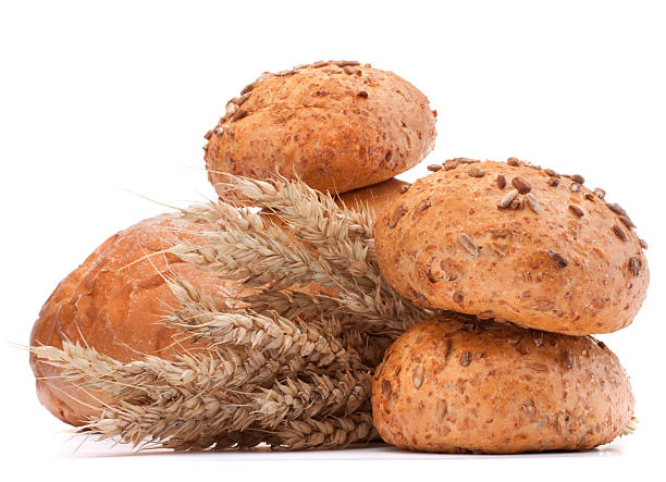 istock hamburger bun or roll  and wheat ears bunch 639371784