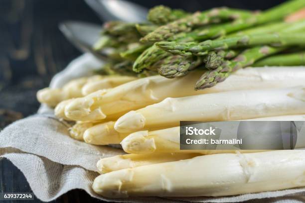 Spring Season Fresh White And Green Uncooked Asparagus Stock Photo - Download Image Now