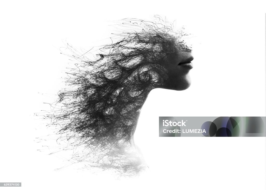 Photograph combined with hand-drawn structure Portrait of a young woman face disappearing Women Stock Photo