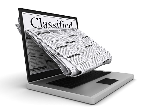 Internet Newspaper Classified Ad Laptop Computer Stock Photo - Download ...