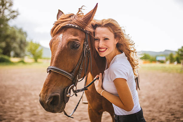 istock Woman and her horse 639377922