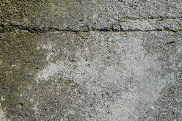 istock background texture of cracked grunge concrete 639378090