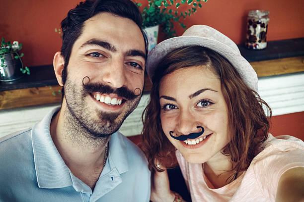 istock Selfie with fake mustaches 639378094
