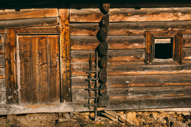 Old wooden log house built in the village