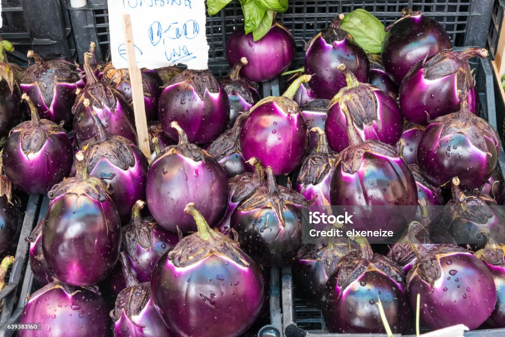 Aubergines for sale at a market Aubergines for sale at a market in Palermo, Sicily Agriculture Stock Photo