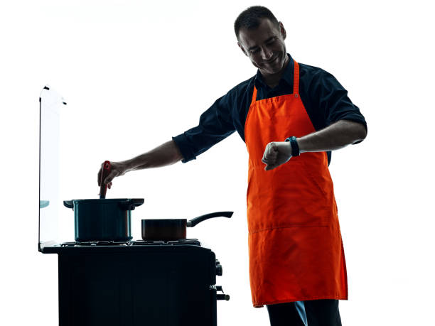 istock man cooking chef silhouette isolated 639384056