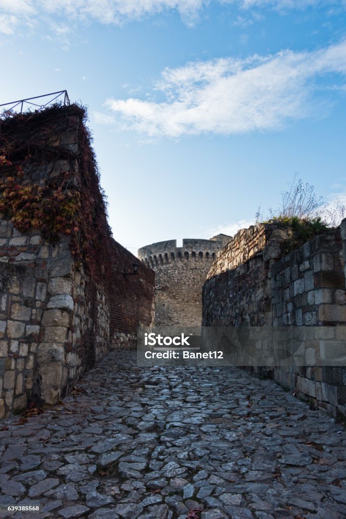 Cobblestone path, walls and towers inside Kalemegdan fortress in Belgrade Cobblestone path, walls and towers inside Kalemegdan fortress in Belgrade, Serbia Ancient Stock Photo