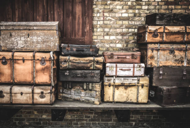istock Vintage leather suitcases stacked vertically - Spreewald, Germany. 639386562