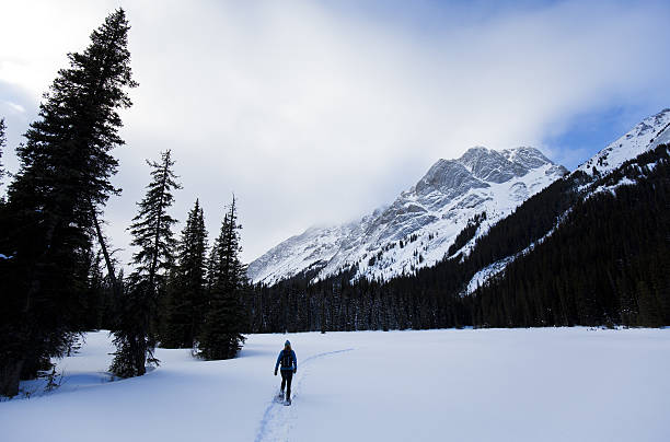 istock Winter Snowshoe Girl 639389456