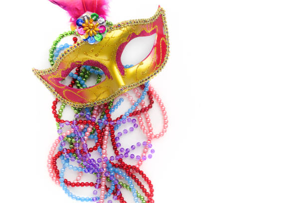 Mardi gras mask and beads on white background.Top view. Mardi gras mask and beads on white background gawdy stock pictures, royalty-free photos & images