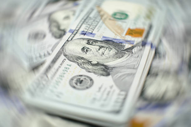 istock Heap of one hundred dollar 639397194