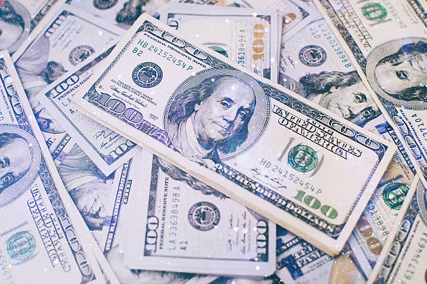 istock Heap of one hundred dollar 639397392