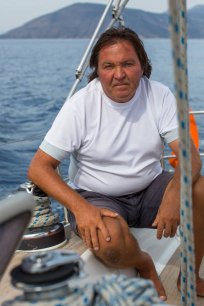 istock Man on a sailing yacht. 639398420