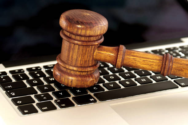 istock Judge hammer on laptop computer 639398674