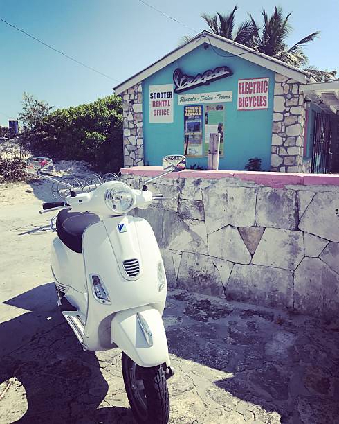 Bike and scooter Rentals in Turks and Caicos Islands Providenciales, Turks and Caicos Islands  - January 23, 2017:  Bike and scooter Rentals in Turks and Caicos Islands Grace Bay stock pictures, royalty-free photos & images