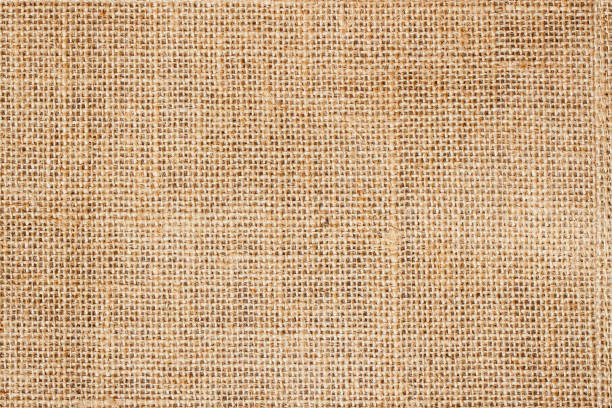 istock Sackcloth or burlap background with visible texture  copy space for 639403256