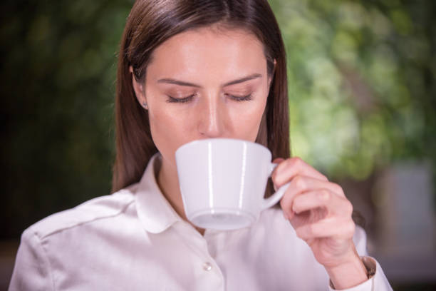 istock Beautiful woman in a cafe 639404448