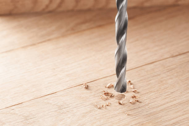 istock drill bit make holes in wooden oaks plank 639405828