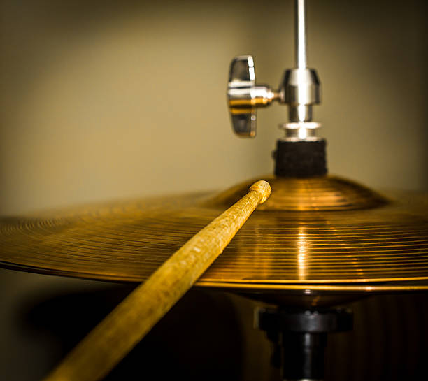 istock plays a drum stick on the hi-hat or ride cymbal 639407042