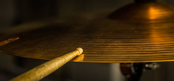 istock plays a drum stick on the hi-hat or ride cymbal 639407074