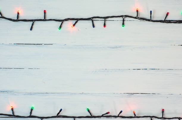 istock electric Christmas garland with colored small bulbs 639410404