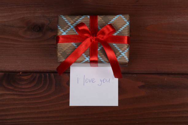 istock beautifully wrapped holiday gift for a loved one 639411998