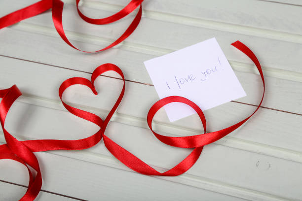 istock saint Valentine's day. Heart from red ribbon. 639412262