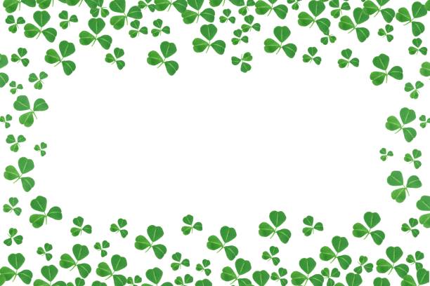 istock St Patricks Day frame of shamrocks over white 639412740