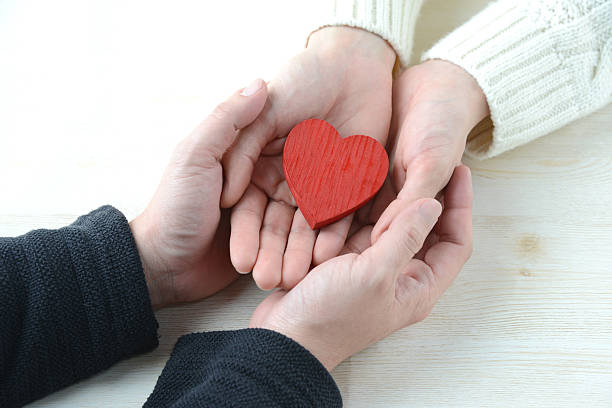 istock Love concepts, heart in hands 639414356
