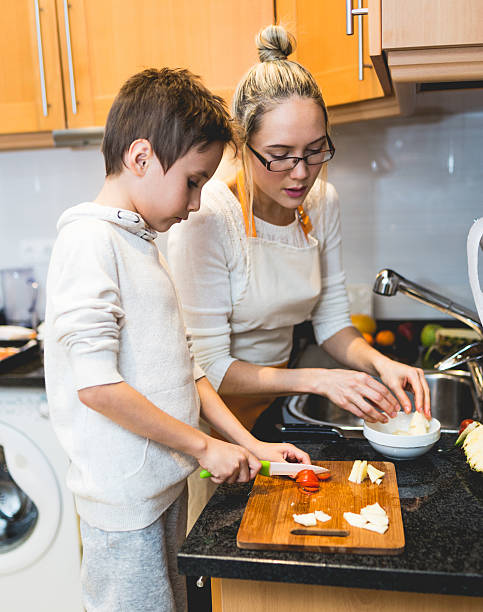 istock Mother and son in the kitchen 639414534