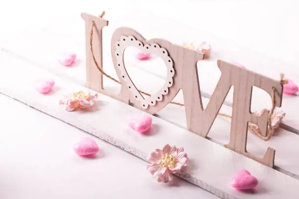Photo of love letters on wooden background