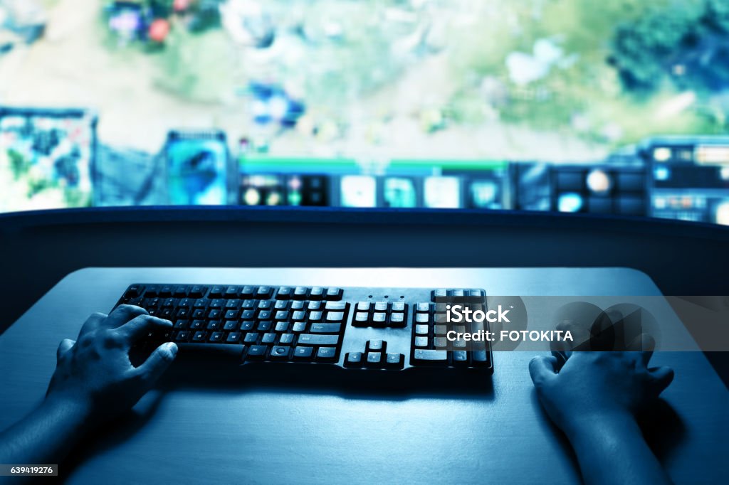 Man playing computer games Leisure Games Stock Photo