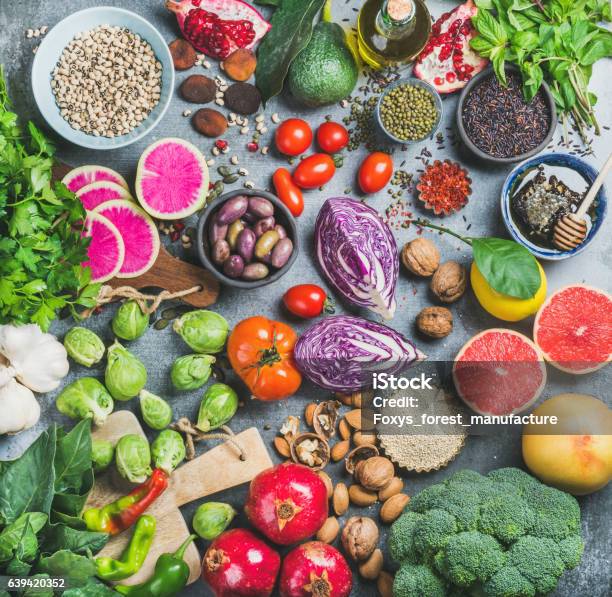 Healthy Raw Food Variety Over Grey Concrete Background Stock Photo - Download Image Now