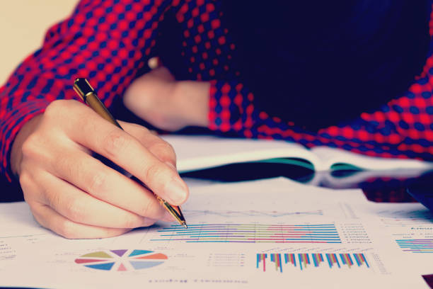 istock Man holding pen and stress in problem with expenses. 639425298