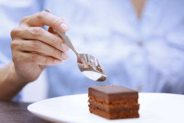 istock Woman eating chocolate cake 639428040