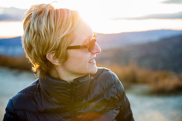 istock Woman Looking At View At Sunset 639429336