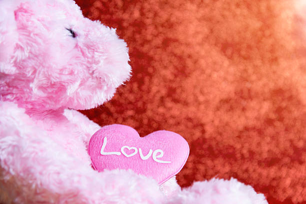 istock teddy Bear with Heart on red background,concept valentine 639439194