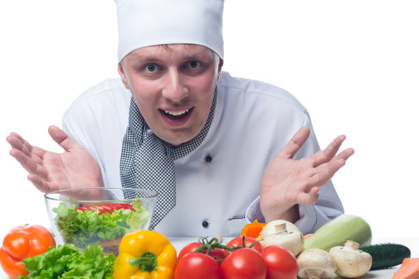 istock chef showing his hands in front of a vegetable salad 639444646