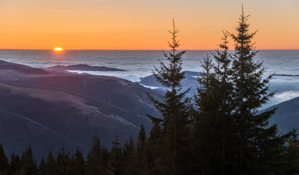 istock Sunrise over cloudy valley 639447966