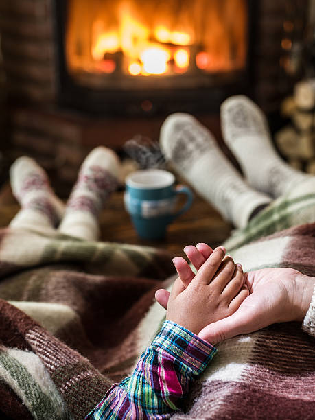 istock Warming and relaxing near fireplace. 639450270