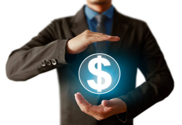 istock financial symbols coming from hand 639450340